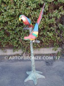 Double Talk statue of two macaws on a branch together