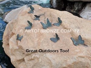 Butterfly Migration statue of rock with butterflies on it