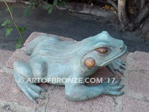 Bronze sculpture of resting frog for outdoor pond, pool or aquatic display