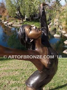 Harmony Light the art of dance and ballet bronze sculpture showing leaping ballerina