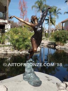 Harmony Light the art of dance and ballet bronze sculpture showing leaping ballerina