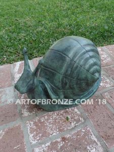 On the Move bronze snail artwork for outdoor garden or indoor display