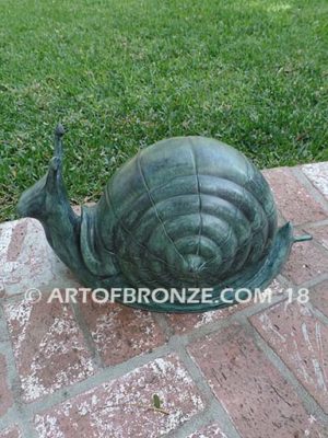 On the Move bronze snail artwork for outdoor garden or indoor display