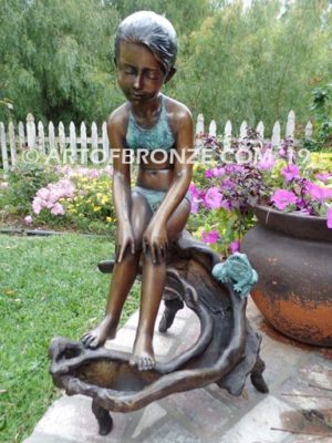 Prince Charming bronze sculpture of bullfrog and girl in bathing suit