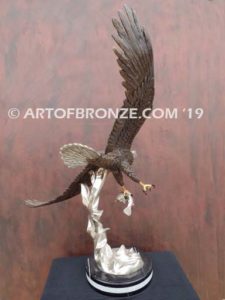 Bronze sculpture of flying bald eagle for indoor or outdoor display