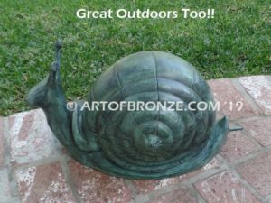 On the Move bronze snail artwork for outdoor garden or indoor display