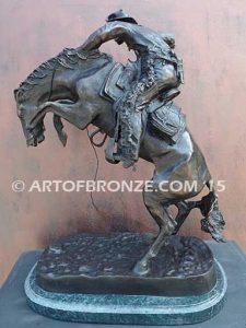 Bronco Buster bronze sculpture after Frederic Remington of cowboy ranger on horse