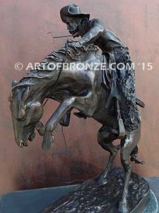 Bronco Buster bronze sculpture after Frederic Remington of cowboy ranger on horse