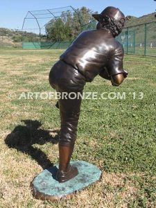 Championship Game bronze baseball player statues featuring a boy pitching and hitting