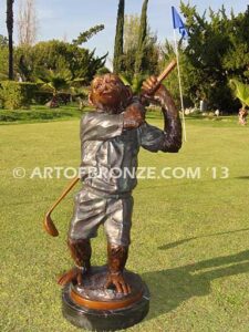 Chimp Golfer special edition, gallery quality chimpanzee dressed up like golfer hitting golf ball