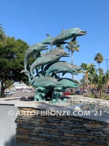 Dolphin Jubilation bronze Art in Public places monument of 11 eleven leaping dolphins over 10 ft. tall