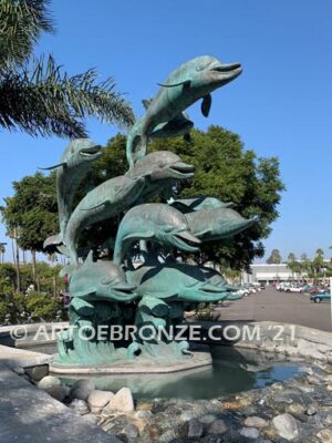 Dolphin Jubilation bronze Art in Public places monument of 11 eleven leaping dolphins over 10 ft. tall