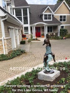 Enchanted Butterfly fantasy bronze sculpture of girl sitting on giant leaf with butterfly