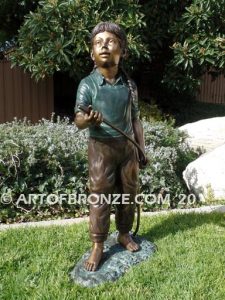 Garden Help outdoor bronze sculpture of standing girl with watering hose