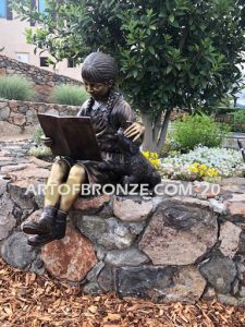 Love and Devotion sculpture of young reader girl with dog and book