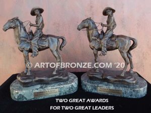 On the Range bronze sculpture of western cowboy on cattle horse