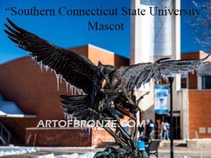 Owl lost wax casting of magnificent and powerful owl hunting on brick pedestal