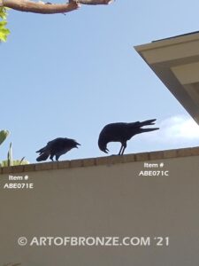 Raven bronze sculpture of standing ravens