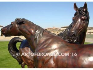 Romance bronze sculpture of standing mare and running colt horse for Griffin Ranch in La Quinta, CA