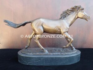 Untamed Spirit sculpture award of charging horse attached to a marble base