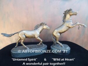 Untamed Spirit sculpture award of charging horse attached to a marble base