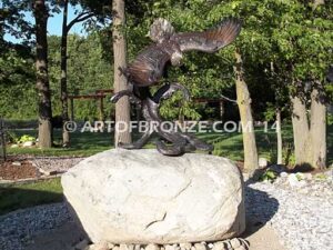 Up Draft bronze sculpture of eagle monument for public tree