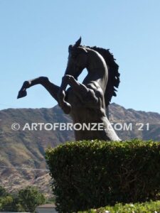 Wild Country sculpture of reared horse with forelegs off the ground and hind legs attached bronze base