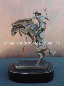 Bronco Buster bronze sculpture after Frederic Remington of cowboy ranger on horse