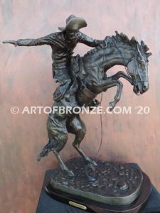 Bronco Buster bronze sculpture after Frederic Remington of cowboy ranger on horse in white house