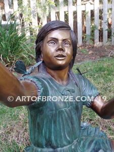 Wings of Joy II bronze sculpture of girl with butterflies on her dress and hands