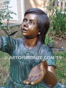 Wings of Joy II bronze sculpture of girl with butterflies on her dress and hands