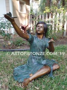 Wings of Joy II bronze sculpture of girl with butterflies on her dress and hands