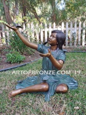 Wings of Joy II bronze sculpture of girl with butterflies on her dress and hands