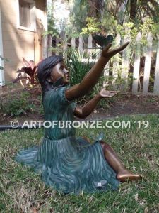 Wings of Joy II bronze sculpture of girl with butterflies on her dress and hands