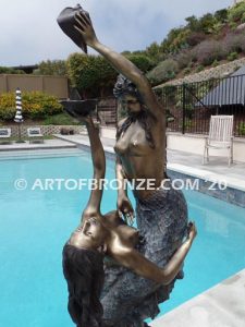 Bronze mermaid sculpture holding oyster shell for pond, pool or aquatic display