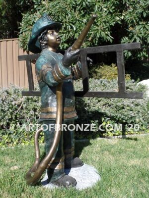 Junior Fireman bronze sculpture of firefighter boy wearing helmet and turnout coat