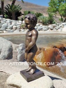 Manneken Pis 17th century bronze sculpture of naked little boy peeing into fountain