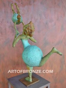 Maternidad bronze gallery sculpture of mother swinging daughter on steel pedestal