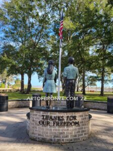 Pledge Allegiance wonderful outdoor bronze sculpture featuring two young kids with right hand on their hearts