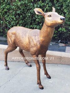 Morning Encounter outdoor monumental bronze buck and doe standing sculptures