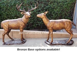 Morning Encounter outdoor monumental bronze buck and doe standing sculptures