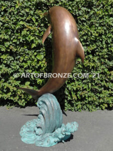 Above the Splash marine art bronze statue leaping dolphin monument