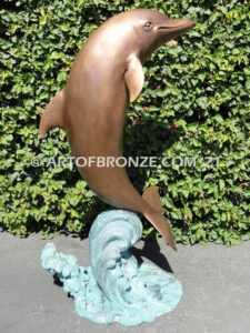 Above the Splash marine art bronze statue leaping dolphin monument