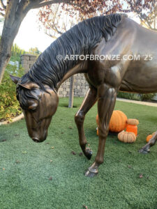 Thoroughbred life-size bronze statue of grazing horse for ranch or equestrian center