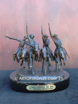 Coming Thru the Rye bronze sculpture after Frederic Remington featuring four horseman on galloping horses