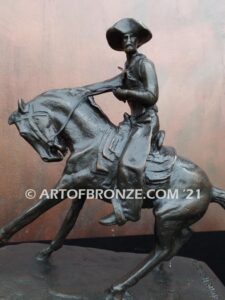 The Cowboy bronze sculpture after Frederic Remington featuring cowboy on horse