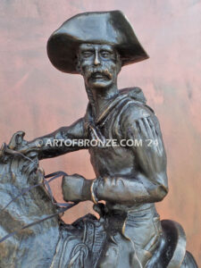 The Cowboy bronze sculpture after Frederic Remington featuring cowboy on horse