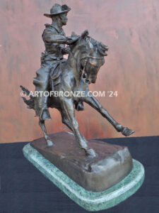 The Cowboy bronze sculpture after Frederic Remington featuring cowboy on horse