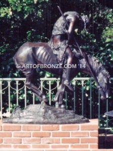 The End of the Trail monumental bronze statue after James Earle Fraser featuring Indian on horse