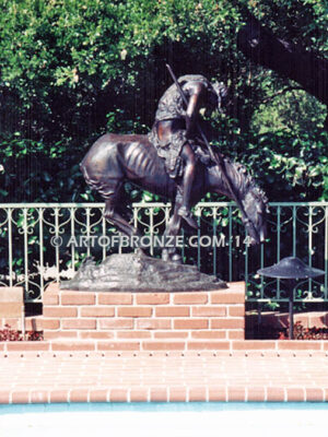 The End of the Trail monumental bronze statue after James Earle Fraser featuring Indian on horse